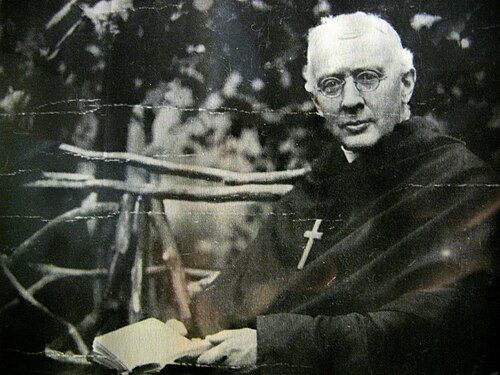 James Huntington Sargent c. 1920s, an older man with glasses and white hair, wearing a monk's robe and cross.